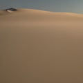 1060 Desert Sand Dunes: A serene and picturesque background featuring desert sand dunes in warm and sandy colors that create a t