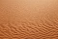 Desert sand ripples, patterns, texture and background. Warm background Royalty Free Stock Photo