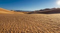 Desert sands against a clear blue sky Royalty Free Stock Photo