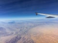 Desert seen from the airplane window flying in the sky