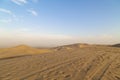 Desert during sunset at Huacachina Oasis in Ica, Peru