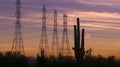 Desert sunset power electricity pylons Arizona evening Royalty Free Stock Photo