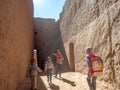 Desert town of Mhamid, Morocco village with nature sand dunes and old muslim mosque in north Africa, old narrow streets,