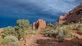 Desert trail leading to a storm in Utah Royalty Free Stock Photo