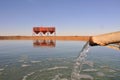 Desert water reservoir Royalty Free Stock Photo