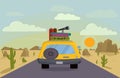 Yellow car track with luggages and telescope on top driving to desert at sunset, moving along the road at desert landscape, go to Royalty Free Stock Photo