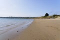 Almost deserted Abersoch beach on a cloudless summer day