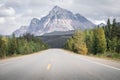 Deserted alpine highway leading to the prominent mountain in the background, Jasper NP, Canada