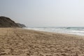 Deserted beach on the Atlantic coast. Neighborhood of Lisbon, Portugal Royalty Free Stock Photo