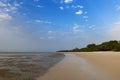 Deserted beach in the island of Orango at sunset, in Guinea Bissau. Orango is part of the Bijagos Archipelago Royalty Free Stock Photo
