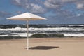 Deserted beach Kaliningrad region Amber lonely umbrella village creates a shadow