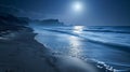 On a deserted beach the moons light illuminates a path on the sand as the waves continue their neverending dance. The