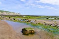 Deserted beach at the North Yorkshire resort of Robin Hoods Bay Royalty Free Stock Photo