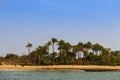 Deserted beach with palm trees in the island of Orango in Guinea Bissau. Royalty Free Stock Photo