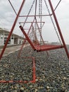 Deserted beach. Prohibition. Epidemic. Quarantine. Deserted place. Sea. Swing. Royalty Free Stock Photo