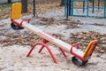 Deserted child swing on playground outdoors. Child amusement outdoor. Equipment for games