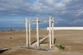 Deserted and Desolate Beach in Winter Time - Empty Structure and Piping for Showers