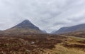 The deserted and empty Road through Glen Coe, and the Highlands of Scotland, with Buachaille Etive Mor at the head of the Glen.