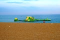 Deserted Wibit inflatable playground on the sea