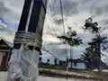 a deserted looking volleyball net with no games on a slightly cloudy afternoon Royalty Free Stock Photo