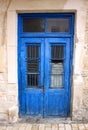 Deserted Old Greek House with Old Blue Door in Chania,Crete,Greece Royalty Free Stock Photo