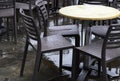 Deserted outdoors restaurant tables Royalty Free Stock Photo