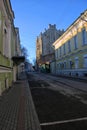 Good deserted quiet Moscow street in early morning in summer without people and cars Royalty Free Stock Photo