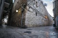 Deserted road crossroad in old city of Jerusalem, Israel. Empty streets of ancient city in the early morning. Travelling in