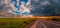 Deserted road under a dramatic sky Royalty Free Stock Photo