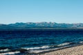Deserted rocky beach of Lake Nahuel Huapi Royalty Free Stock Photo