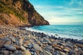 Deserted rocky pebble beach