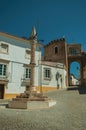 Deserted square with marble pillory and old buildings Royalty Free Stock Photo