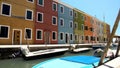 Deserted street of Burano island, colorful houses with closed windows, Venice Royalty Free Stock Photo