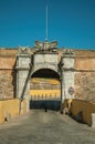 Deserted street going toward city wall gateway Royalty Free Stock Photo