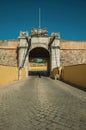 Deserted street going toward city wall gateway Royalty Free Stock Photo