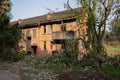 Deserted tile-roofed brick apartment building in former 630 factory