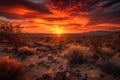 desertscape with dramatic sunset, featuring fiery reds and oranges Royalty Free Stock Photo