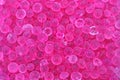Desiccant Silica Gel Background, Pink Translucent Crystals Textu