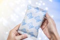 Desiccant Silica gel bag on hand Royalty Free Stock Photo