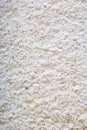 Desiccated coconut texture pattern as background. White abstract coconut coco cover background.