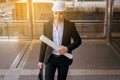 Design Architect walking up on stairs,Hurry to work on street