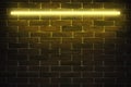 For design background texture of empty red brick wall with yellow neon light lamp, 80s style glow Royalty Free Stock Photo