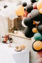 Design birthday party outdoor with baloons and drip chocolate cake