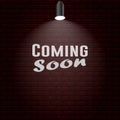 Coming Soon with Red Brick and Spotlight Royalty Free Stock Photo