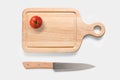 Design concept of mockup tomato on cutting board and knife set Royalty Free Stock Photo