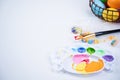 Design concept - Preparing for Easter celebration, painting Easter eggs with colorful Acrylic pigment color dyestuff in palette,