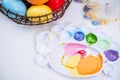 Design concept - Preparing for Easter celebration, painting Easter eggs with colorful Acrylic pigment color dyestuff in palette,