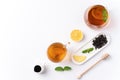 Design concept top view of honey black tea with lemon and mint