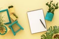 Design concept - top view of white A4 flipped paper with black clipboard Royalty Free Stock Photo