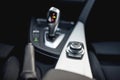 Design details of minimalist modern car - close-up details of automatic transmission and buttons